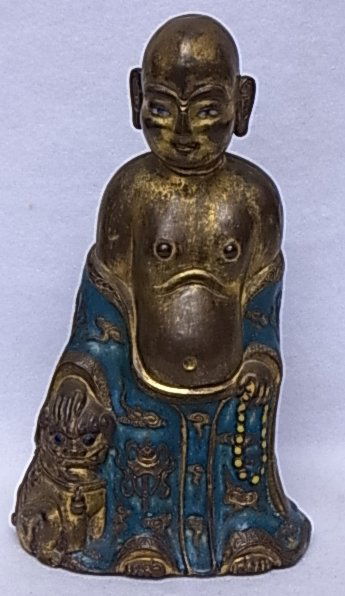 Old & Interesting Bronze or Brass Embossed Gilt Bu: Description: Old & Interesting Bronze or Brass Embossed Gilt Buddha with Foo Dog Statue Statuary Figure Group Hard Enameled Cloisonné Eyes & Robe 9” Tall Provenance Florida Gulf Coast Collection o