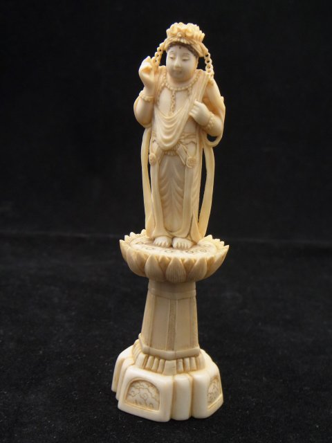Finely Carved Ivory Buddhist Goddess or Deity Guan: Finely Carved Ivory Buddhist Goddess or Deity Guan Yin Lotus Column Base Antique Statue Description: Nice warm patina. Very nice detailing. Approx. Dimensions or Size: 4” tall Hess Fine Auctions