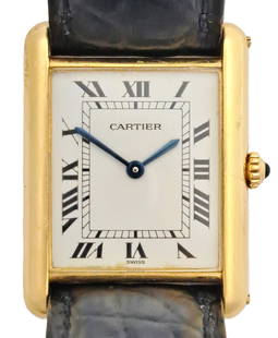 Stunning Mens 18K Gold 1990s Cartier Tank Watch w/ Box Papers Tags: Described By:Dillon 65294 NTDD Title:Stunning Mens 18K Gold 1990s Cartier Tank Watch w/ Box Papers Tags Description: Stunning Mens 18K Gold 1990s Cartier Tank Watch w/ Box Papers Tags Condition: P