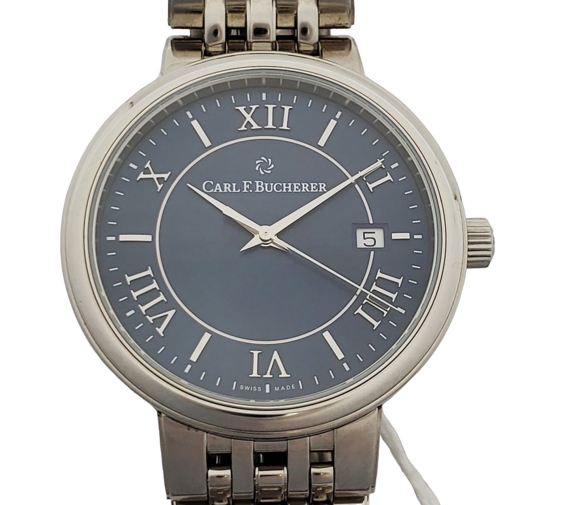 NOS Carl F Bucherer Adamavi 10314.08 Automatic Blue Roman Dial Mens Wrist Watch Box: Described By:Michelle NEED 00.10314.08.55.21 Title:NOS Carl F Bucherer Adamavi 10314.08 Automatic Blue Roman Dial Mens Wrist Watch Description: New Old Stock Carl F Bucherer Adamavi 10314.08 Automatic