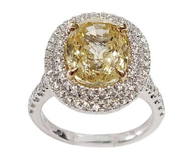 Delicious 5.73ct Natural Yellow Sapphire 18k White Gold Fine White Diamond Double Halo Ring: Title: Delicious 5.73ct Natural Yellow Sapphire 18k White Gold Fine White Diamond Double Halo Ring Description: A very large, approx. 5.73ct natural fancy yellow sapphire is encircled in a double hal