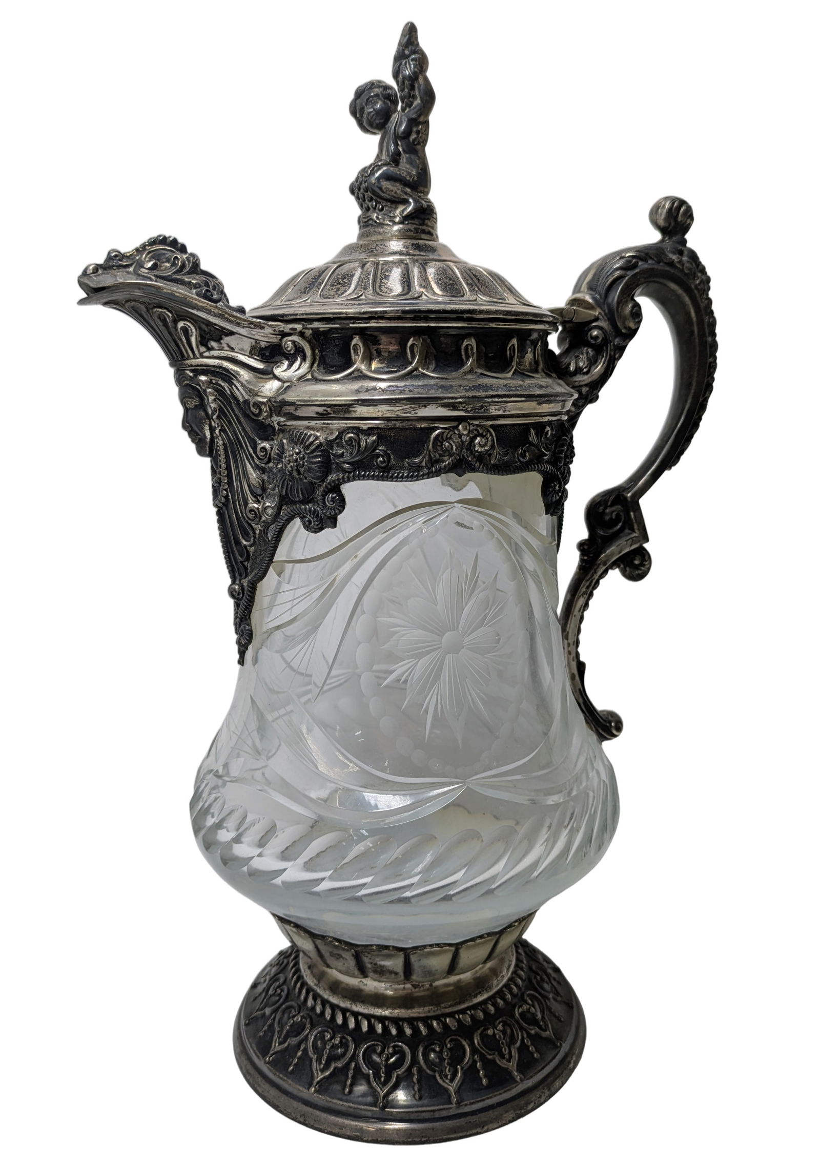 Big Heavy Antique Sterling Silver Mounted ABP Cut Glass Lidded Bacchanal Cherub Finial Wine Claret: Described By:Dillon CNX VX 0334 1084 Title:Big Heavy Antique Sterling Silver Mounted ABP Cut Glass Lidded Bacchanal Cherub Finial Wine Claret Handled Pitcher Jug Repousse Description: Big Heavy