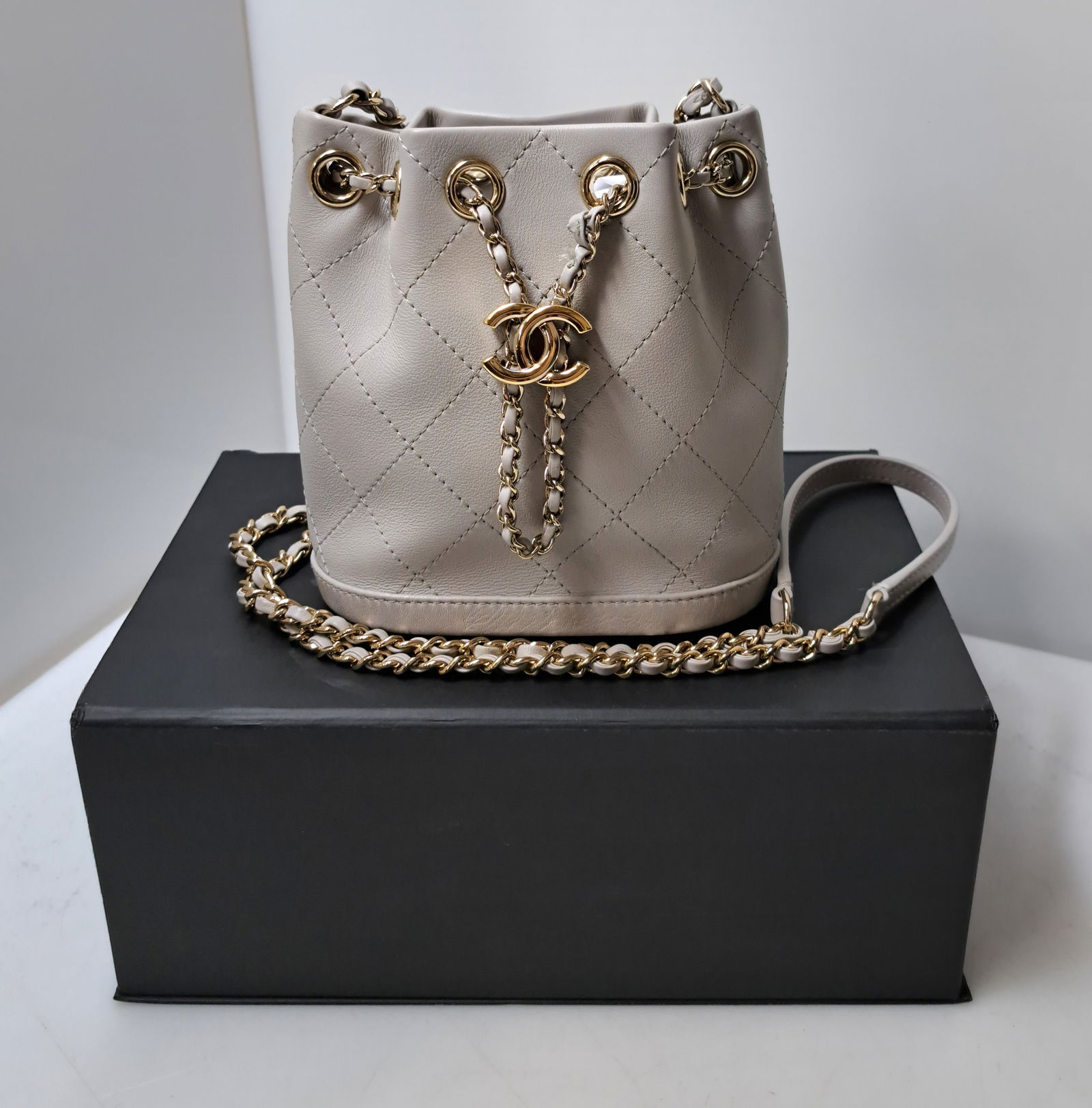 Chanel Gray Quilted Calfskin Mini Drawstring Bucket Bag Gold Hardware Signed Numbered 2019 - 2