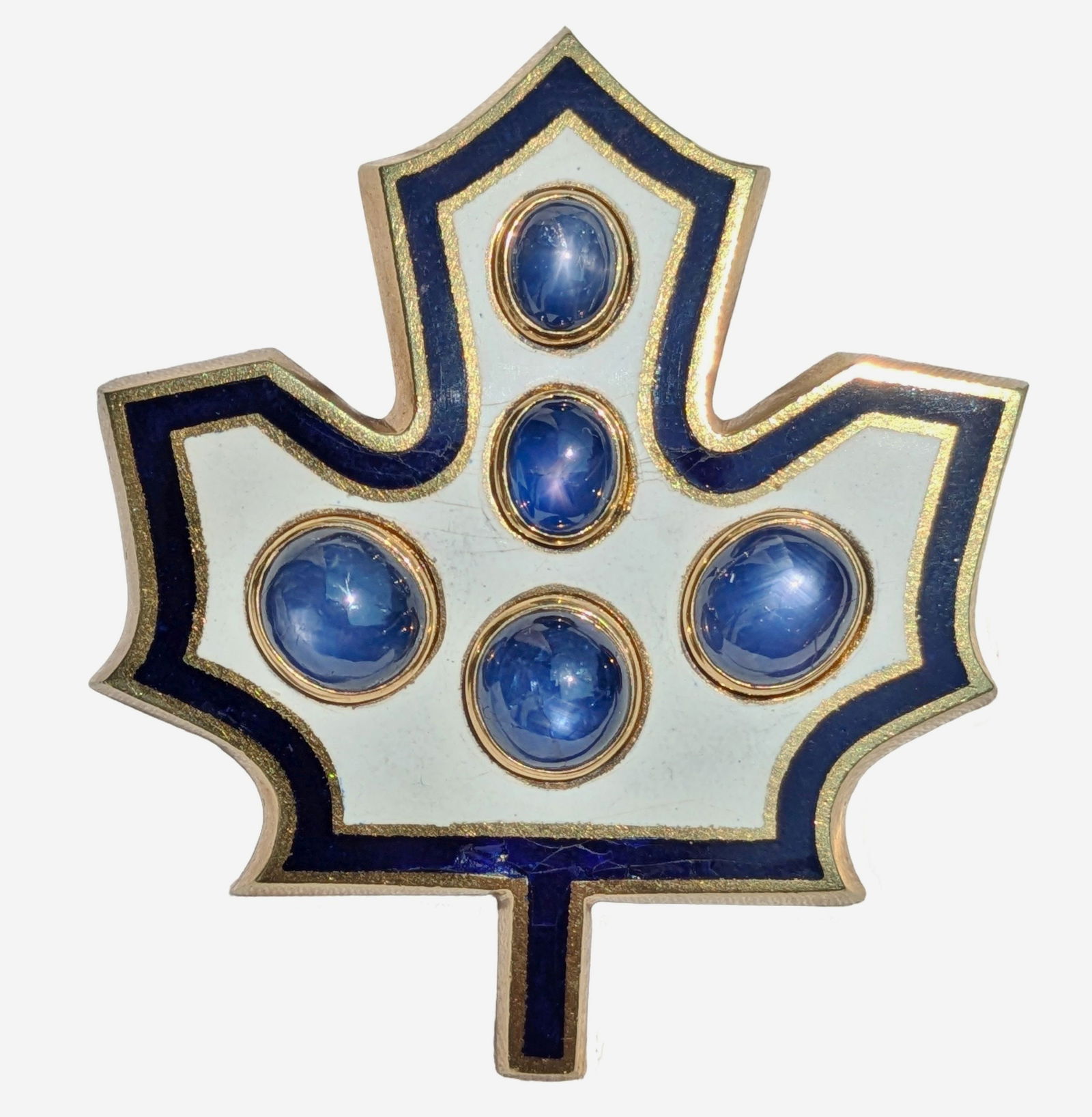 Artist Signed Heavy 18K Gold Natural Star Sapphire Blue White Enamel Maple Leaf Brooch Pendant: Described & Photographed By: Dillon CNX 0444 1426 Title: Artist Signed Heavy 18K Gold Natural Star Sapphire Blue White Enamel Maple Leaf Brooch Pendant Description:Artist Signed Heavy 18K Gold Natura