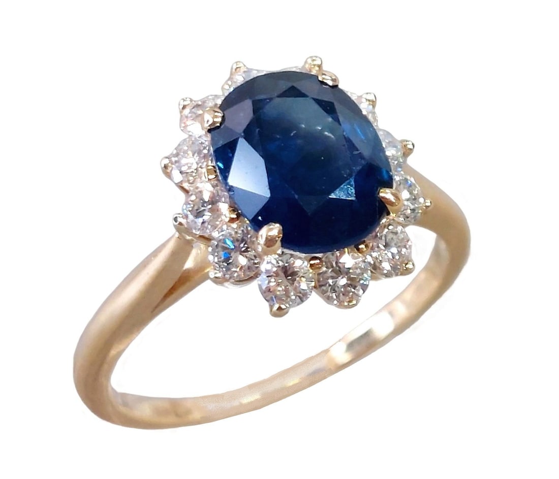 Tiffany & Co 2.44ct Natural Burma Sapphire 0.66ctw Diamond 18k Gold Halo Ring w/ Papers: Described & Photographed By: CHRIS AJP GIA / NTDDD 67672 / EST. $5000-$10,000 Title: Tiffany & Co 2.44ct Natural Burma Sapphire 0.66ctw Diamond 18k Gold Halo Ring w/ Papers Description: This