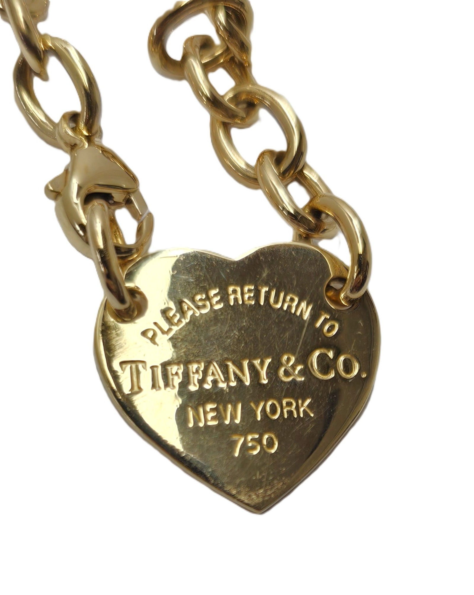 Tiffany & Co Authentic Heart Tag Return To 18K Gold Heart Necklace: Described & Photographed By: Adams / DT71700 / Please scroll down to see ALL images Title: Authentic 18k Gold Tiffany & Co Heart Necklace Description: Authentic 18k Gold Tiffany &