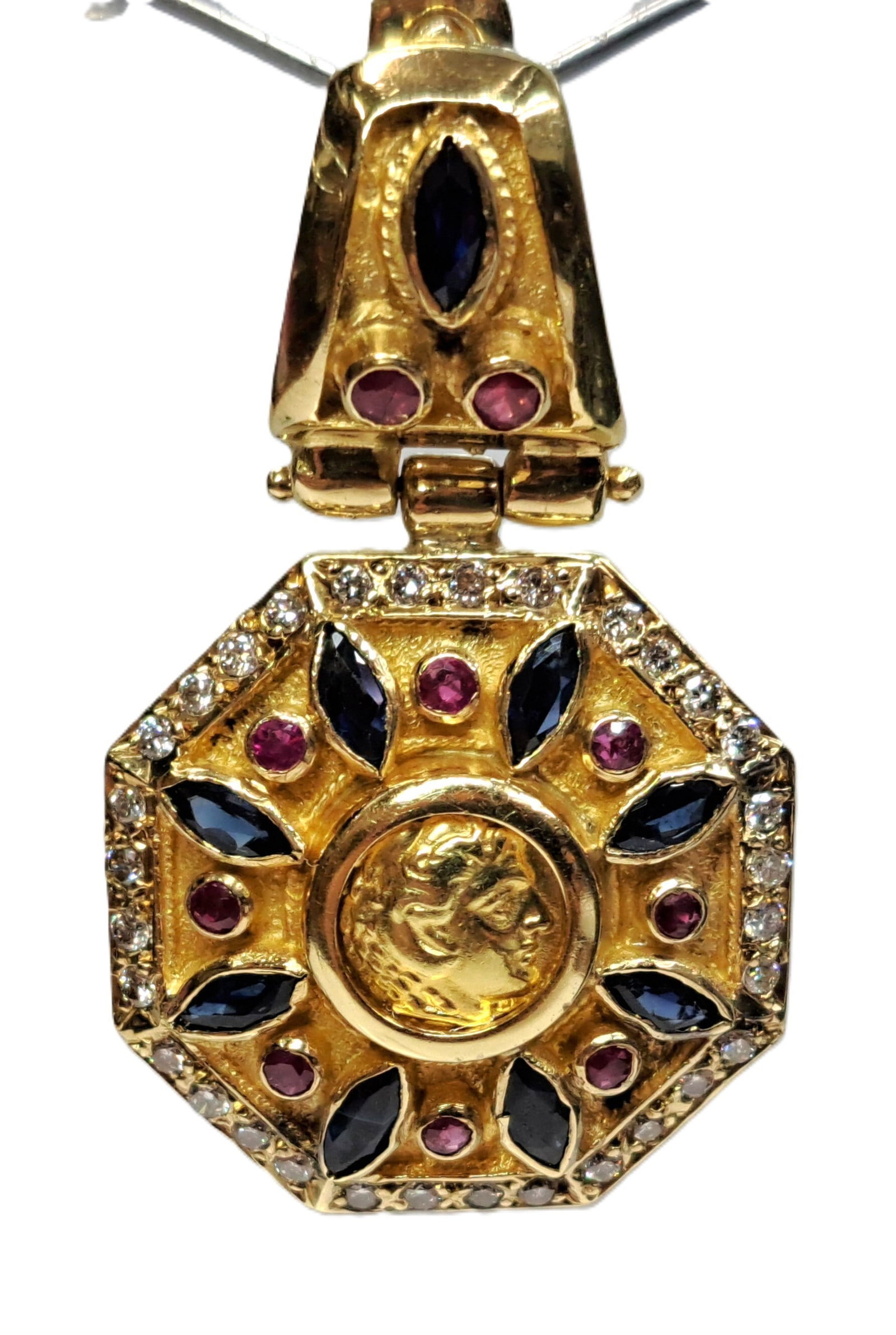 Heavy 18k Gold 2.08ctw Natural Ruby Diamond Sapphire Nick The Greek Coin Motif Pendant w Orig Papers: Described By: Mike Messink NFGDD Title: Heavy 18k Gold 2.08ctw Natural Ruby Diamond Sapphire Nick The Greek Coin Motif Pendant w Orig Papers Description: Beautiful piece! Comes with its original paper