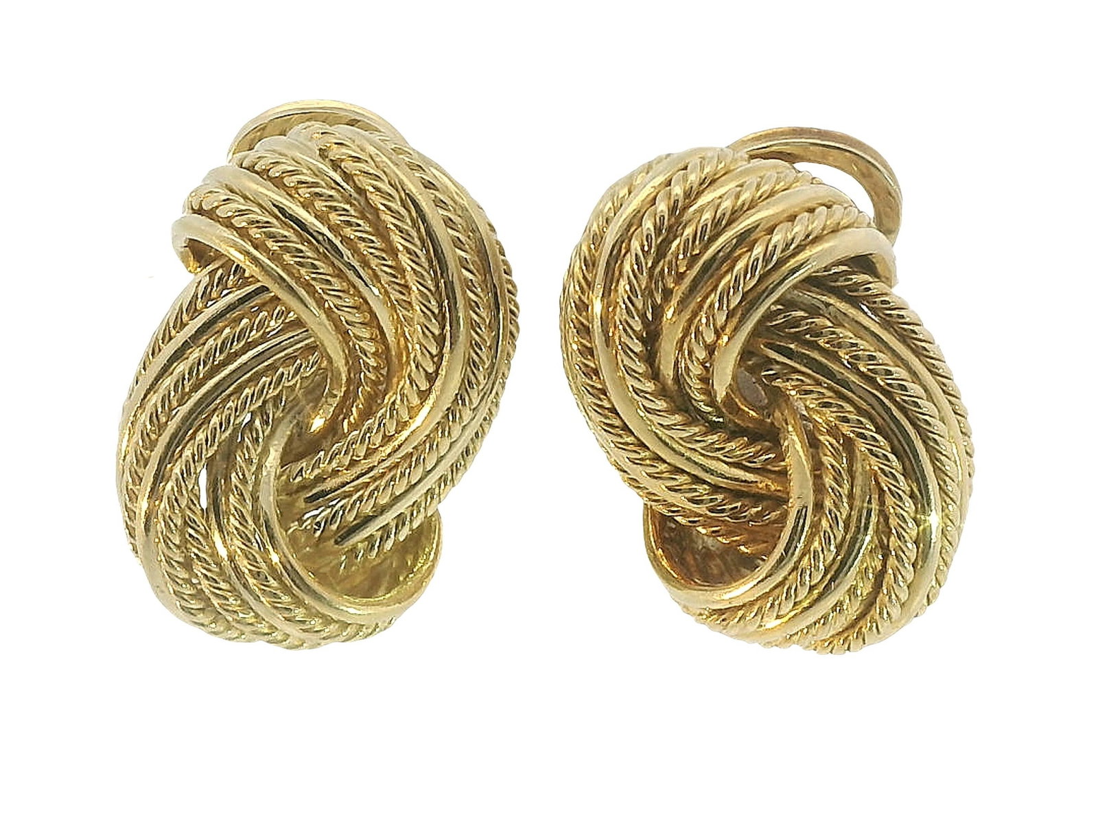 Vintage Tiffany 18k Gold Rope Motif Finely Made Love Knot Ear Clip Earrings 26.7 grams: HFA DT70368 Described By: Chris AJP GIA NRTED Title: Vintage Tiffany 18k Gold Rope Motif Finely Made Love Knot Ear Clip Earrings 26.7 grams Description: A classic pair