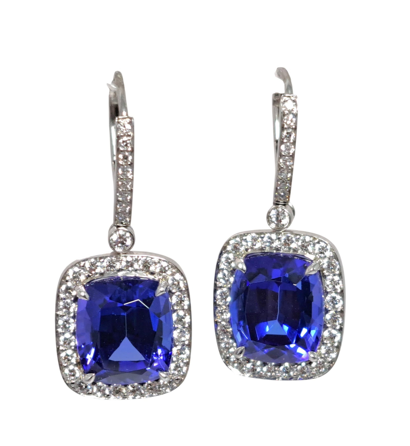 Breathtaking Tiffany & Co. 11.4ctw Tanzanite Diamond Halo Platinum Earrings w Papers: HFA DT73088 Described By: Mike NYDDD Title: Breathtaking Tiffany & Co. 11.4ctw Tanzanite Diamond Halo Platinum Earrings w Papers Description: These are stunning! We checked auction results but can
