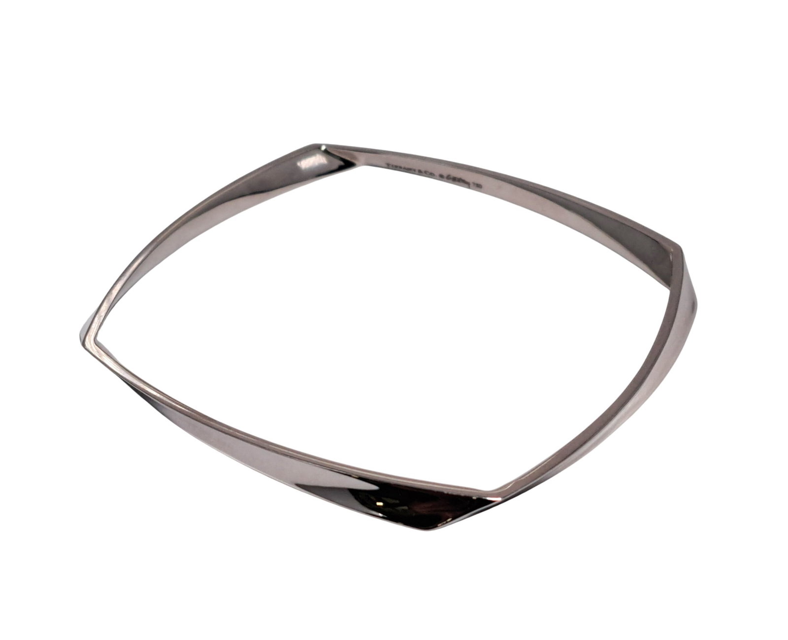Tiffany & Co. Frank Gehry Ultra Large Size 18k Gold Torque Bracelet w Pouch & Papers: HFA DT73102 Described By: Mike NREDD Title: Tiffany & Co. Frank Gehry Ultra Large Size 18k Gold Torque Bracelet w Pouch & Papers Description: Very cool piece! M
