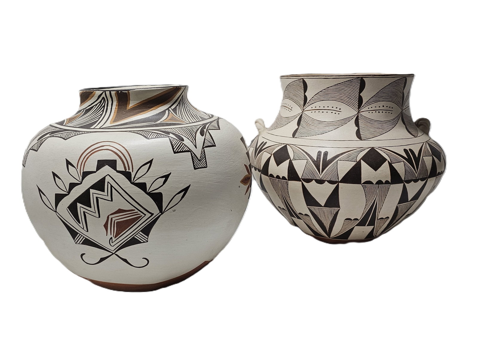 Two Very Large Olla Jars Laguna & Isleta Pueblo New Mexico Polychrome Ceramic: CNX VX 0484 1716 Described By: Adams ND Title: Two Very Large Olla Jars Laguna & Isleta Pueblo New Mexico Polychrome Ceramic Description: Two Very Large Olla Jars L