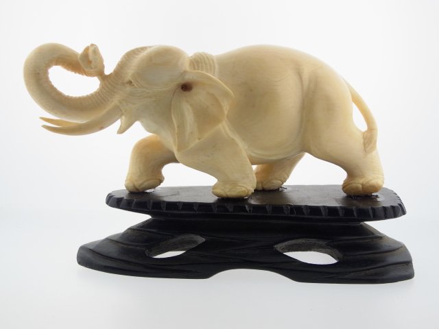 Beautifully Carved Chinese Ivory Elephant on Teak Wood: Beautifully Carved Chinese Ivory Elephant on Teak Wood Base Plinth Figure Figurine Sculpture High quality, older ivory that indicates antique age. The carving style of many detailed concentric lines i