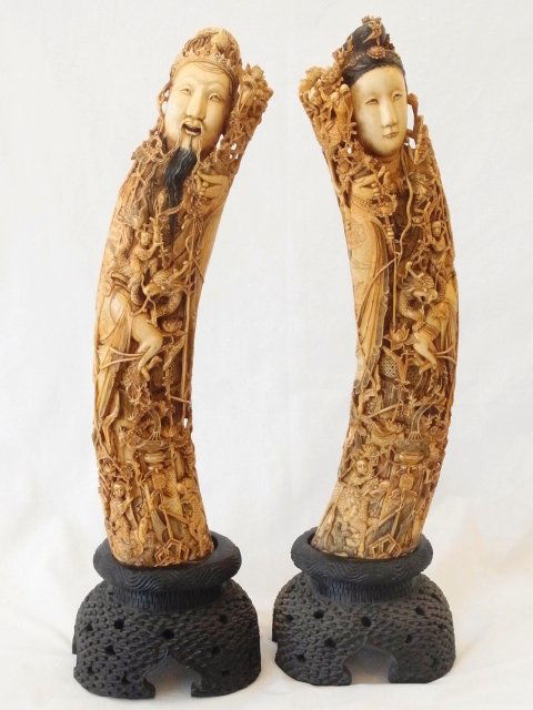 Pair Incredible Ornately Carved Round Chinese Signed Iv: Pair Incredible Ornately Carved Round Chinese Signed Ivory Tusks Dragons Emperor Empress Statues With Buddhist Bodhisattva Figures On Dragons Incredibly carved details of dragon like creatures mounted