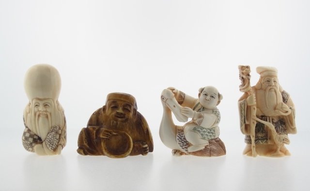 Lot of 4 Carved Antique Ivory Chinese & Japanese Netsuk: Lot of 4 Carved Antique Ivory Chinese & Japanese Netsukes Deities Figurines Lot of 4 antique carved ivory figurines. Two are signed Japanese Gods; Jorojin and Fukurokuju, and each features a polychrom