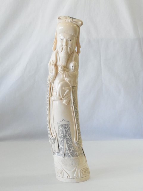 Antique Carved Inked Japanese Solid Ivory Tusk Jurojin: Antique Carved Inked Japanese Solid Ivory Tusk Jurojin Peach Boy Figure Statue 7 Lucky Gods with Rustic Craftsmanship. We suspect this to be a rather ancient piece of ivory based on how "stiffly" carv