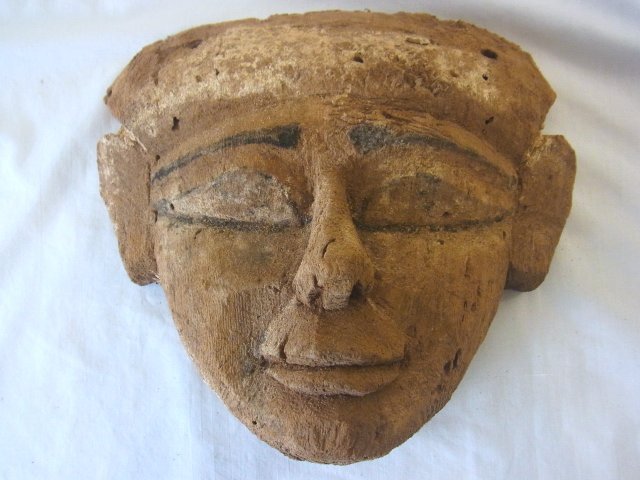 Ancient Egyptian Wood Carved Funerary Burial Mask Antiq: Ancient Egyptian Wood Carved Funerary Burial Mask Antiquity Circa 350 BC Ptolemaic Period Decorated with Pitch and White Pigment In Egyptian art, black (kem) symbolized death, appropriate for the Eye 