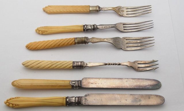 100 Year Old Collection Ivory and Resin French Ivory Ha: 100 Year Old Collection Ivory and Resin French Ivory Handled Sterling Silver and Silver Plate Knife and Fork Assortment. Mixed style for antique décor, repurposed or for replacements. Family ties to