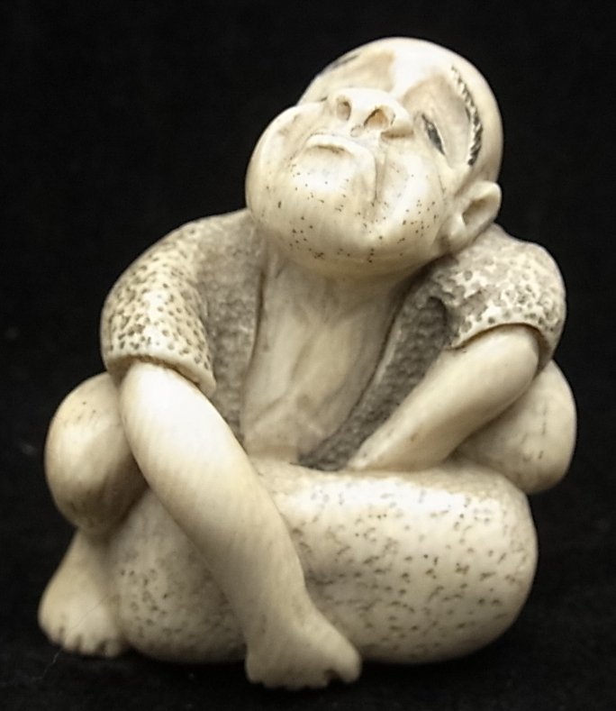 Antique Japanese Ivory Monochrome Okimono Signed Netsuk: Antique Japanese Ivory Monochrome Okimono Signed Netsuke Man’s Life Struggle SIZE: Approx 1.4” tall X 1” wide Description: This is an early piece of ivory that is clearly signed. It is meant t