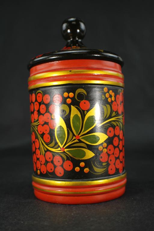 Vintage Soviet Era Khokhloma Jar: Vintage Soviet Era Treen Khokhloma Jar, decorated in a berry design, marked on the bottom "Made in USSR", circa 1989. This jar measures approximately 3-5/8 inches in diameter by 6-5/8 inches tall. No 