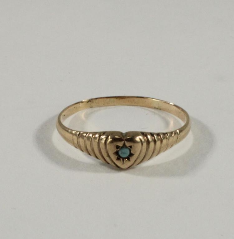 18K Yellow Gold Ladies Ring with Turquoise Stone: Heart Shaped design on front of ring with one small turquoise stone in it. Stamped "18K". Size 6. Weighs approximately .6dwt. From the estate of David Hanger.