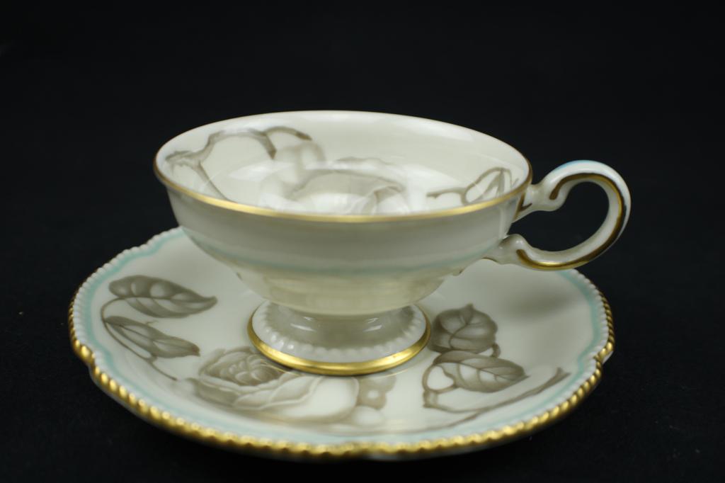 Vintage Castleton China Gloria Tea Cup & Saucer: Vintage Castleton China Gloria Pattern Footed Tea Cup & Saucer with Gold Trim. The saucer measures approximately 4-7/8 inches in diameter, and the tea cup measures approximately 3-1/8 inches in diamet