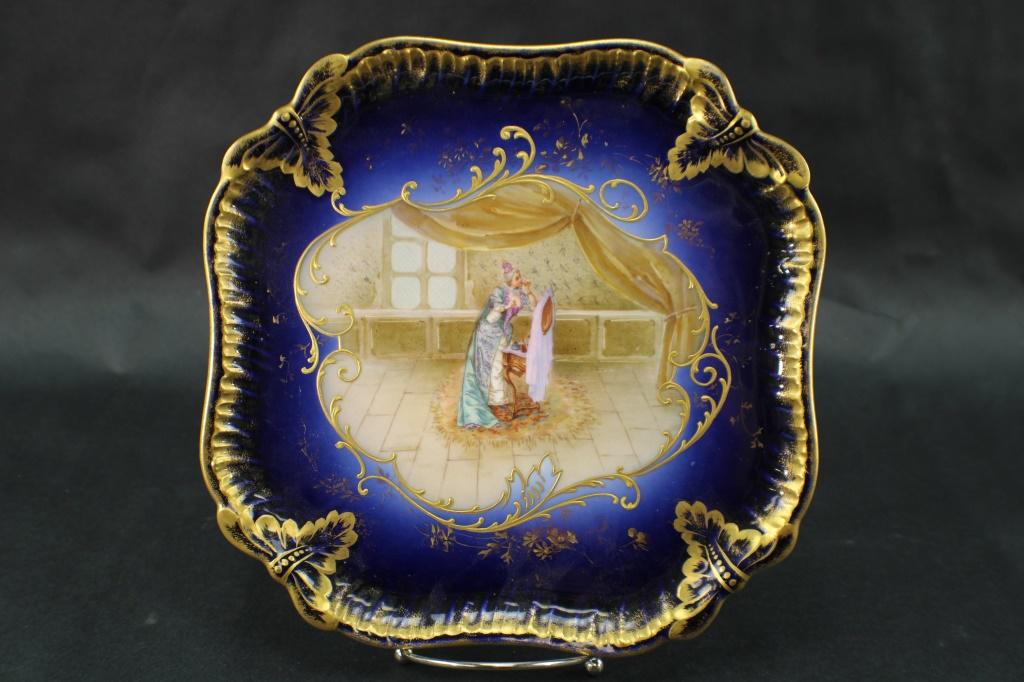 Wm Guerin & Co. Limoges Cobalt & Gold Plate: Antique Wm Guerin & Co. Limoges Cobalt & Gold Portrait Plate, depicting a woman applying makeup while looking into a mirror. This modified octagon plate is marked on the reverse with a underglaze Wm. 