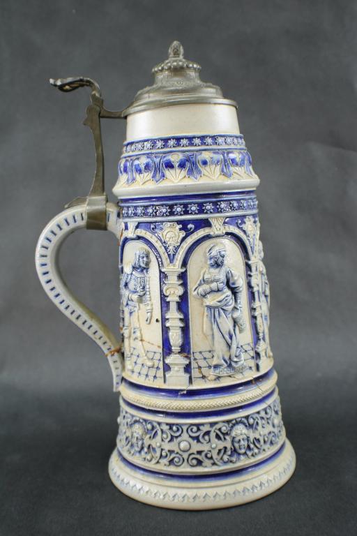 Antique Ceramic and Pewter Beer Stein: Antique Ceramic and Pewter Beer Stein in Blue and Gray, marked "1177". This stein measures approximately 5-5/8 inches in diameter (8 inches with the handle) by 12-3/4 inches tall. The ceramic stein in