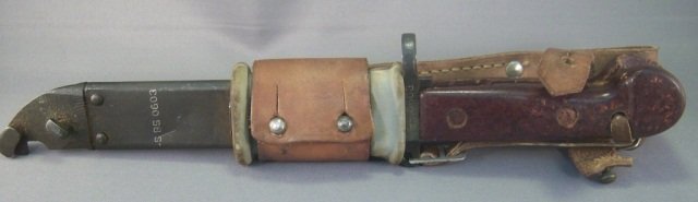 NVA Viet Cong VC AK47 Machine Gun Bayonet&Scabbard: North Viet Namese Army NVA Viet Cong VC AK 47 Machine Gun Bayonet & Scabbard. Both are hand engraved 'S BS 0603'. Includes the leather belt frog