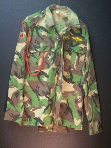 10 Assorted Military Uniforms: US Two Piece Utility Uniform, Russian Tanker's Uniform (2pc), Vintage US Camo Parka Small, Tanker's Coveralls Size 9 Long Large, Large/Reg Combat Coat, US Army Uniform Shirt, West German Camouflage Pa