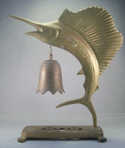Vintage Unpolished Brass Marlin Sculpture w/ Bell: Vintage brass sculpture of an ascendant marlin, with a bell hung below its head. Bell does not contain a clapper. Underside marked Made in Hong Kong" (slightly worn). Minor corrosion consistent with u