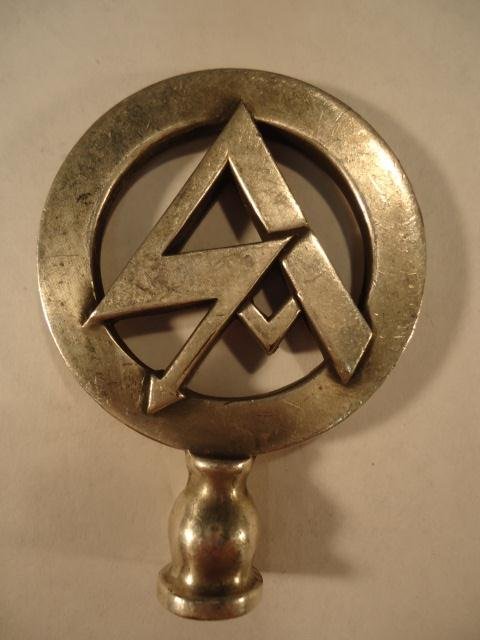 German SS Brown Shirts Officers Staff Car Pole Top: German World War II SS Brown Shirts Officers Staff Car Pennant Pole Top. Measures by 1 3/4" by 2 3/8". Maker marked 'DRGM'. Nickel construction"