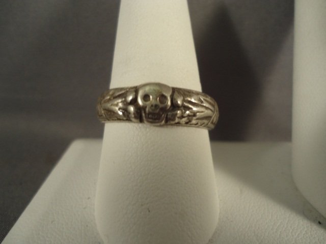 German Waffen SS Officers Totenkopf Skull Wed Ring: German World War II Waffen SS Officers Totenkopf Skull Wedding Ring. The inside is inscribed S U A Muller 8.10.42 H Himmler'. Measures 3/4 inside diameter"