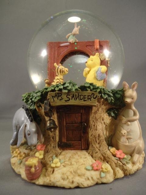 Classic Winnie the Pooh Snow Globe: Classic Winnie the Pooh Snow Globe - Plays "Winnie the Pooh" - Bottom Comes off to Insert a Wallet Size Picture in the Frame in the Snow Globe - Stands Approx 6" Tall approx 5" Across at Base