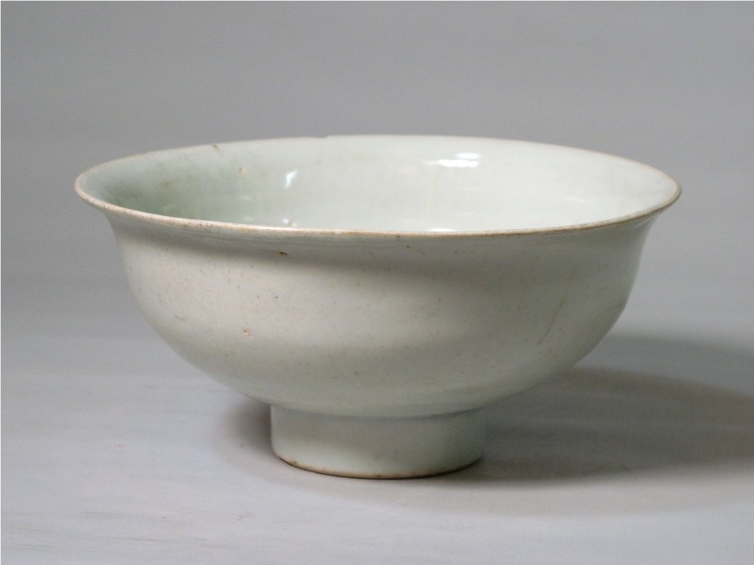 A Chinese Yingqing Bowl, Yuan Dynasty: With rounded sides rising to a gently flared rim. H: 7.5 cm, D: 16 cm