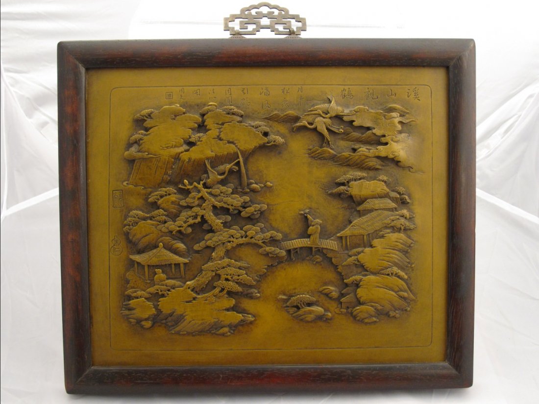 A Chinese Duan Ink Stone Carved Panel, 19th C: A Chinese Duan Ink Stone Carved Panel, 19th Century. Of olive color and depicting two scholars in a mountain landscape with three cranes in flight, and accompanied by an inscription above, hard wood f