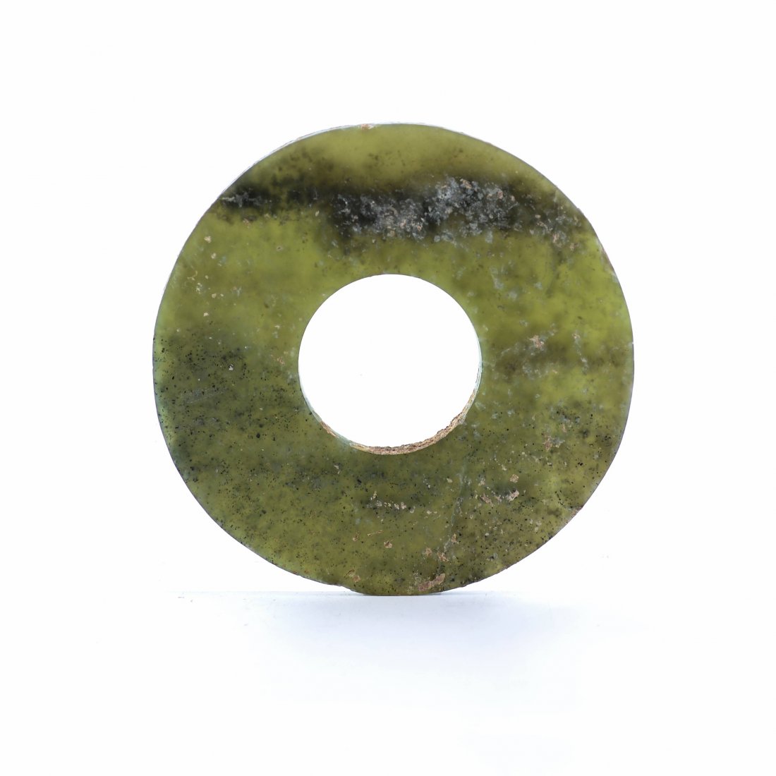 A Chinese Green Jade Disc Bi, Shang Dynasty (1 of 1)