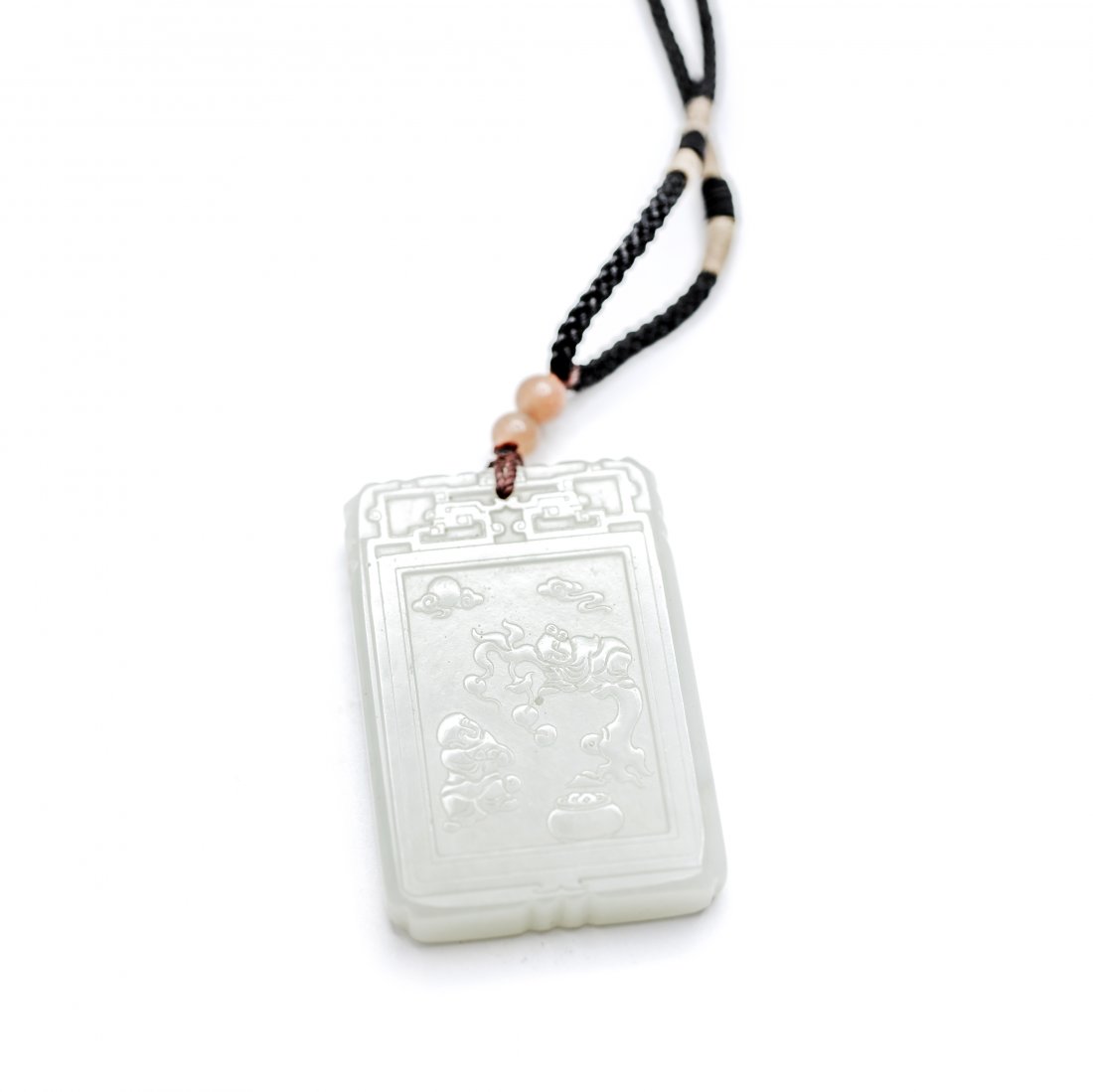 A Fine White Jade Pendant (1 of 3)