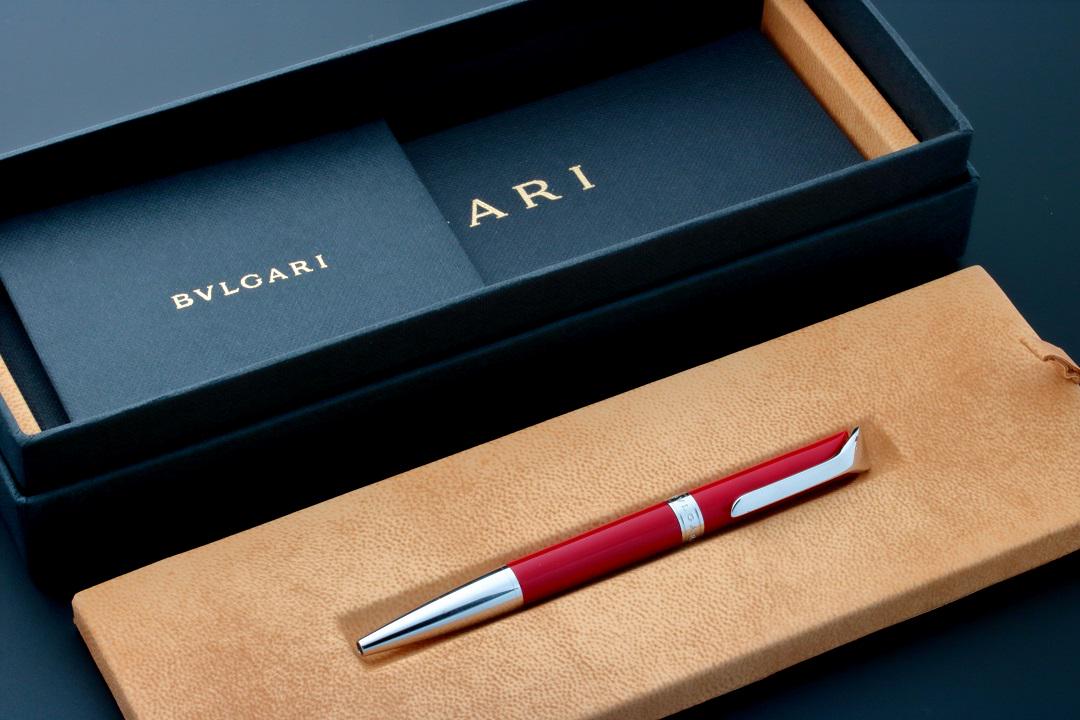 Bvlgari Scripta Volant Ballpoint Pen: Bvlgari Scripta Volant ballpoint pen. Sterling silver and red celluloid. Made in Italy. Stamped 925 under the clip indicating sterling silver. Black ink. Accompanied by a fitted Bvlgari pen