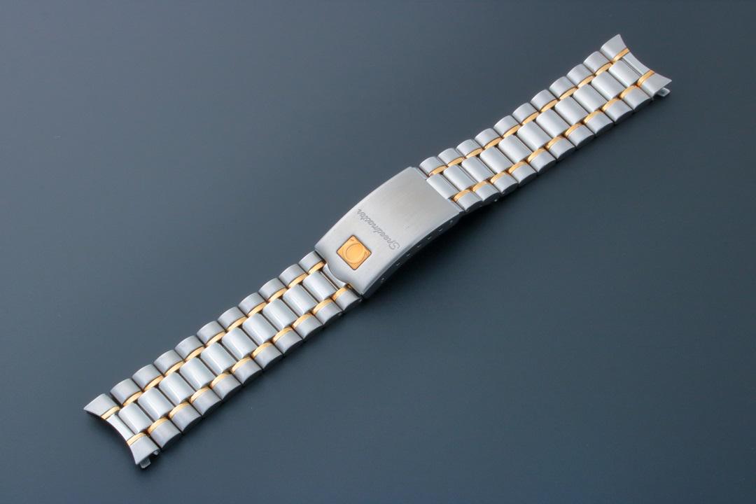 Omega Speedmaster Watch Bracelet 18MM 1469/811: Stainless steel and yellow gold 18mm Omega Speedmaster watch bracelet. Swiss made. Buckle stamped Omega 1469/811 with matching end pieces stamped 811. Comes as shown without spring bars. App