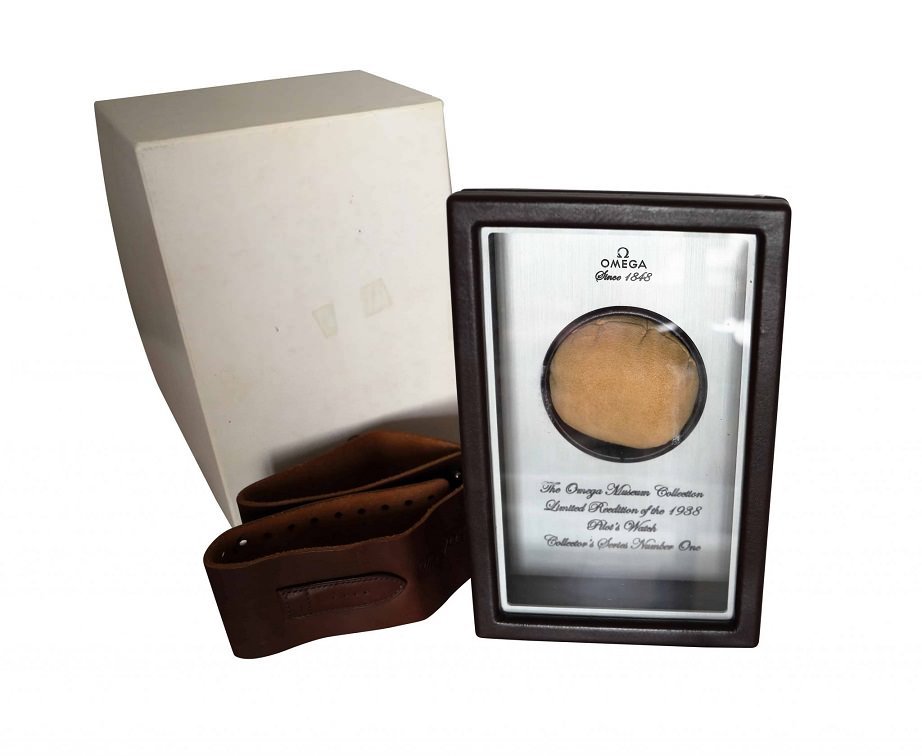 Omega Pilot Museum Watch Box with Omega Pilot Strap: Brand: Omega Pilot Museum Approximate dimensions: 8.5in x 5.5in x 3.5in Condition: Good Important Notes: We provide as much information as possible. Condition reports reflect our opinion only, to the 