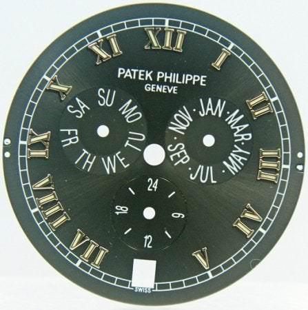 Patek Philippe #5035 Annual Calendar Dial: Dark gray Patek Philippe #5035 annual calendar dial with white gold Roman numeral hour markers. Patek Philippe no longer sells individual parts, thereby making this dial very rare and difficult to obt
