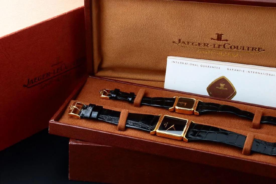 Jaeger LeCoultre His and Hers Watch Yellow Gold: Very rare and unusual vintage 18k yellow gold Jaeger LeCoultre men`s and ladies wristwatch box set, circa 1978. Black Jaeger LeCoultre with Dauphine style gold hands. Smooth yellow gold bezel. Swiss m
