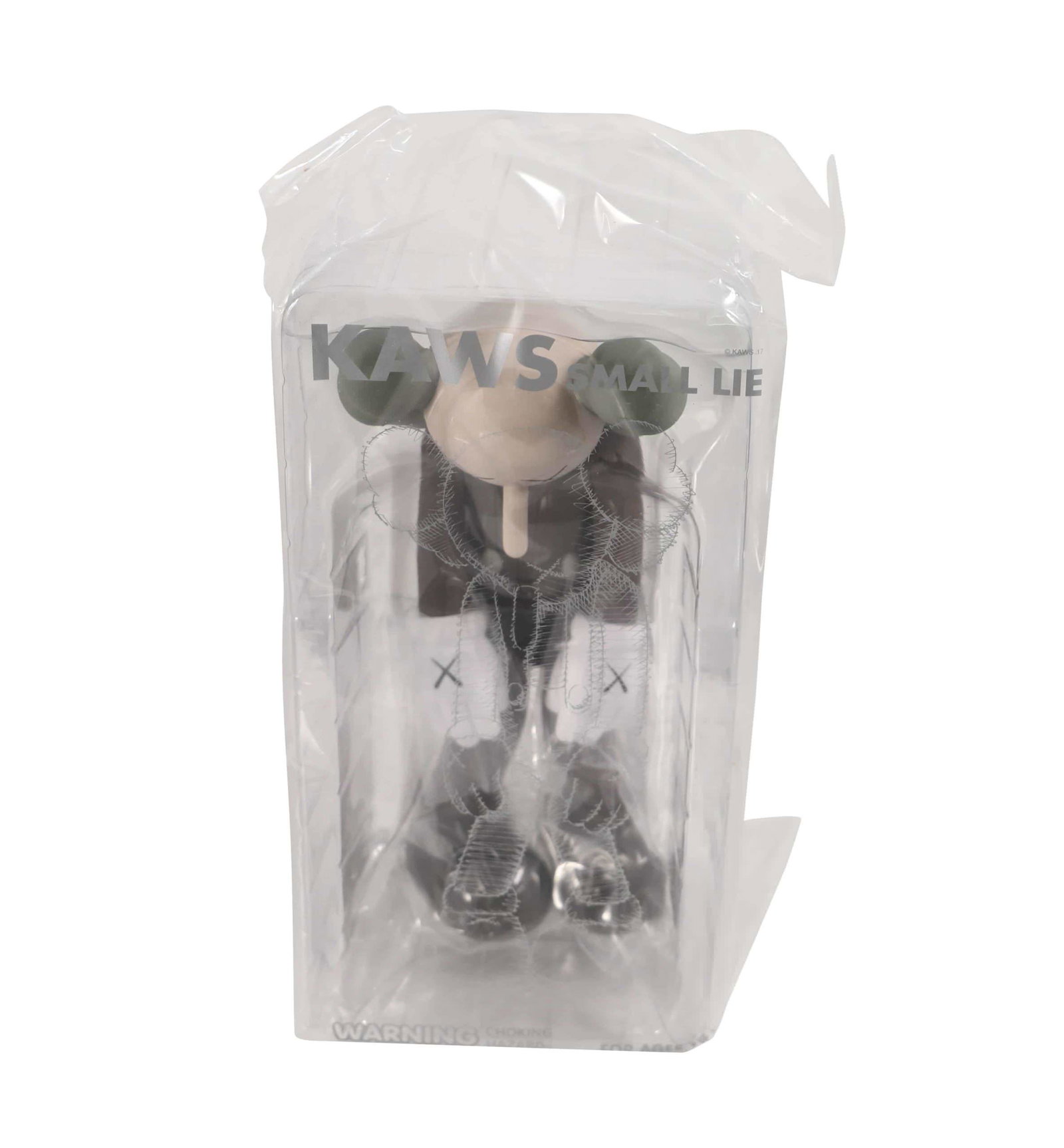 KAWS Small Lie Brown Vinyl Figure Sealed: Artist: KAWS Title: Small Lie Brown Medium: Vinyl Approximate Dimensions: 11in Edition: 2017 Provenance: Private collection Condition Report: