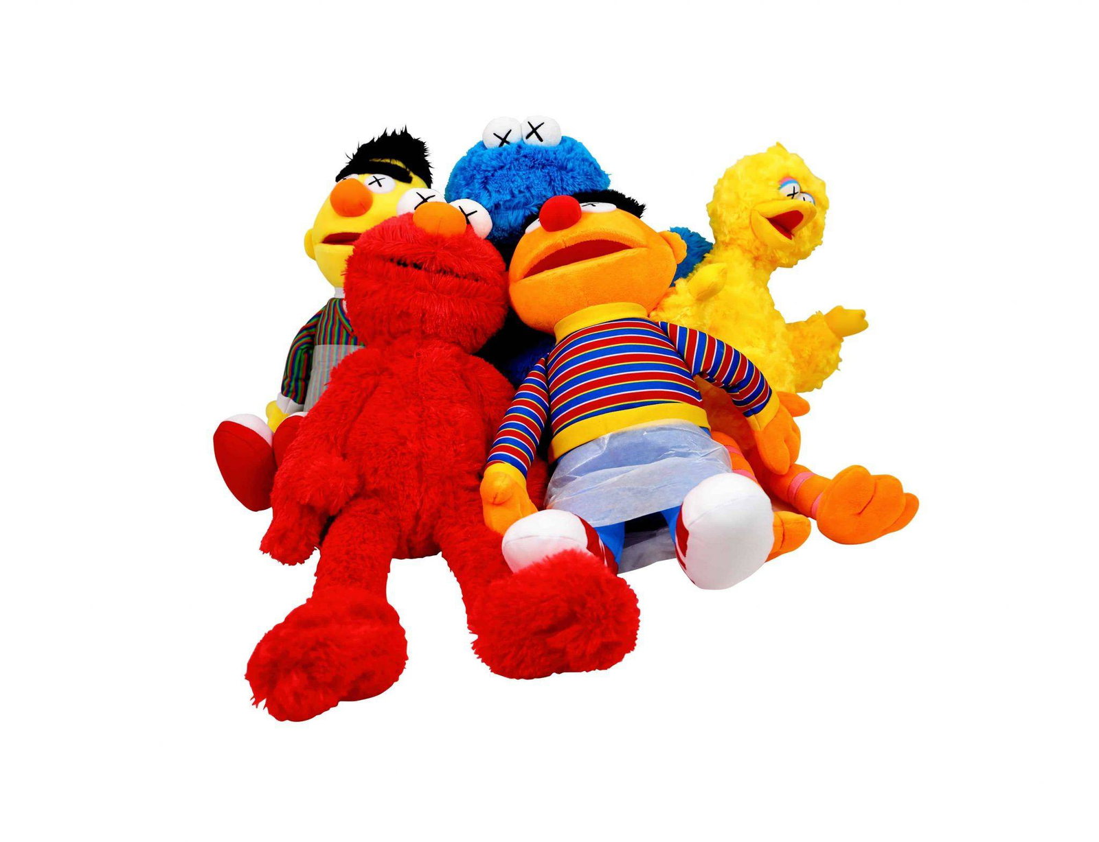 KAWS Sesame Street 5 Plush Figure Set: Artist: KAWS Title: Sesame Street 5 Plush Figure Set - Bert, Ernie, Cookie Monster, Elmo, Big Bird Medium: Polyester Collaboration: Uniqlo x Sesame Street Approximate Dimensions: