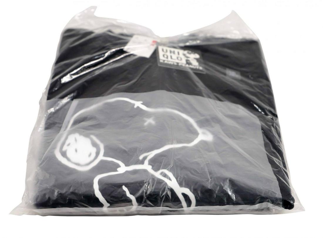 KAWS x Snoopy Peanuts Sweatshirt XL Black: Artist: KAWS Title: Snoopy Sweatshirt – Black Colorway Collaboration: Peanuts x Uniqlo Size: X-Large Edition: 2017 Provenance: Private collection