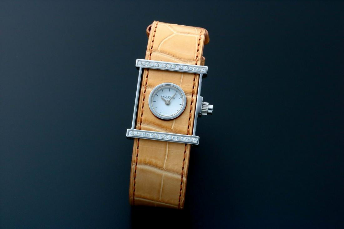 Ladies Pequignet Cameleone Diamond Watch Set: Stainless steel ladies Pequignet Cameleone diamond cocktail dress wristwatch. White Pequignet dial with painted black Roman numeral hour markers. Diamond bezel totaling 32 diamonds. Swiss made, quartz