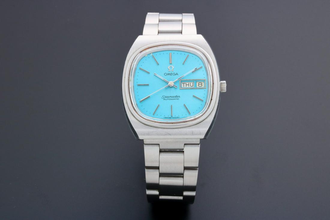 Omega 166.0211 Seamaster Day Date Blue Dial Watch: Unusual vintage stainless steel men`s Omega Seamaster wristwatch with day and date, ref #166.0211. Blue Omega dial with applied silver indexes and center seconds. Swiss made, automatic movement, O