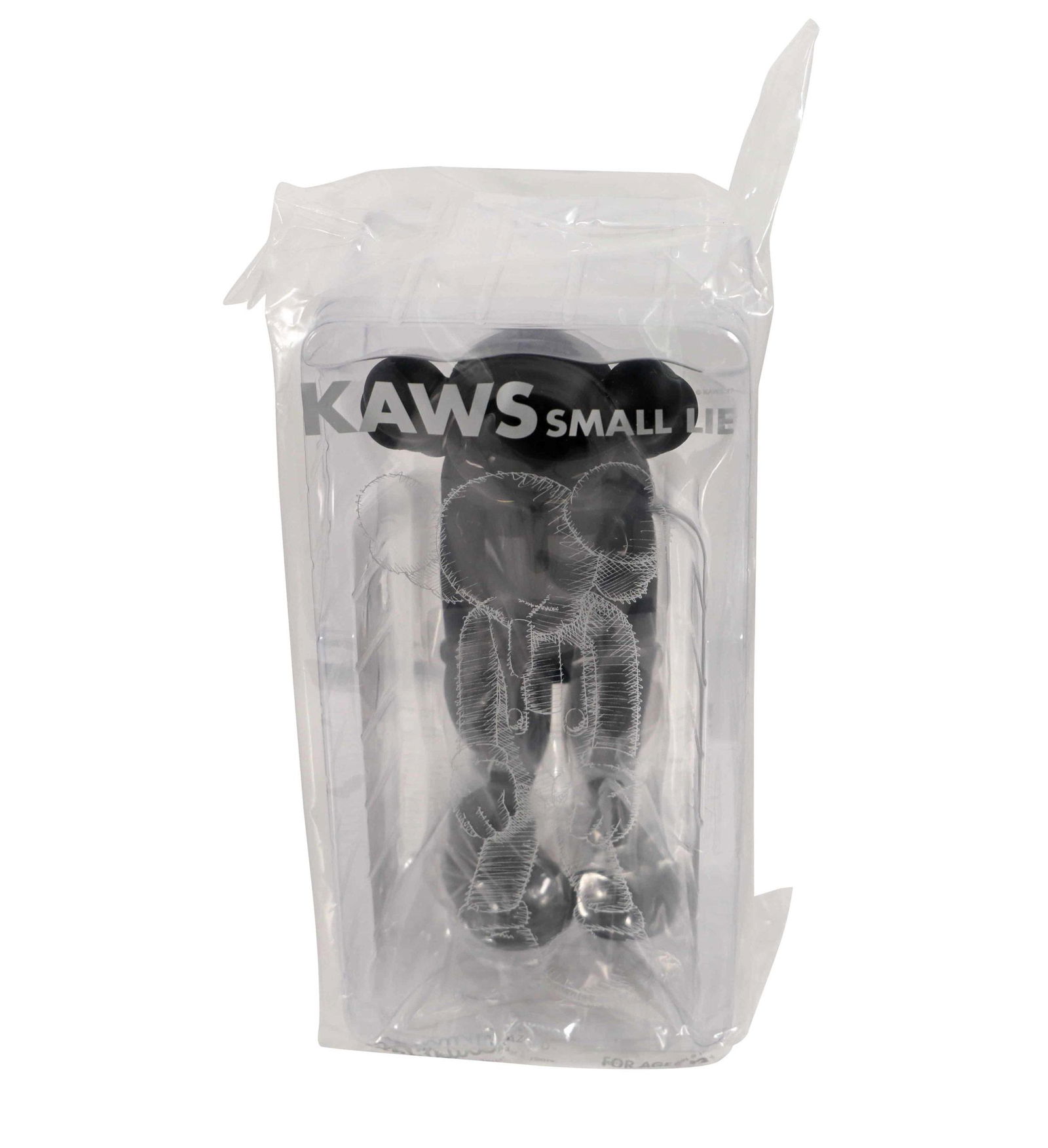 KAWS Small Lie Black Vinyl Figure Sealed: Artist: KAWS Title: Small Lie Black Medium: Vinyl Approximate Dimensions: 11in Edition: 2017 Provenance: Private collection Condition Report: Never been opened. Sealed in ori