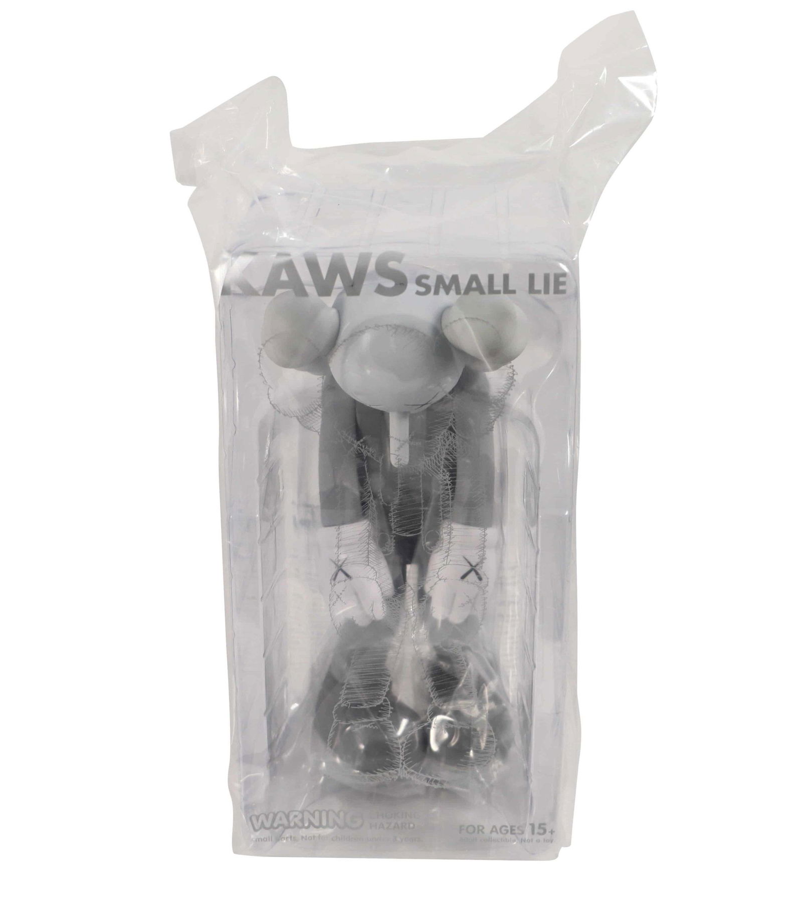 KAWS Small Lie Gray Vinyl Figure Sealed: Artist: KAWS Title: Small Lie Grey Medium: Vinyl Approximate Dimensions: 11in Edition: 2017 Provenance: Private collection Condition Report: Sealed in original packaging wi