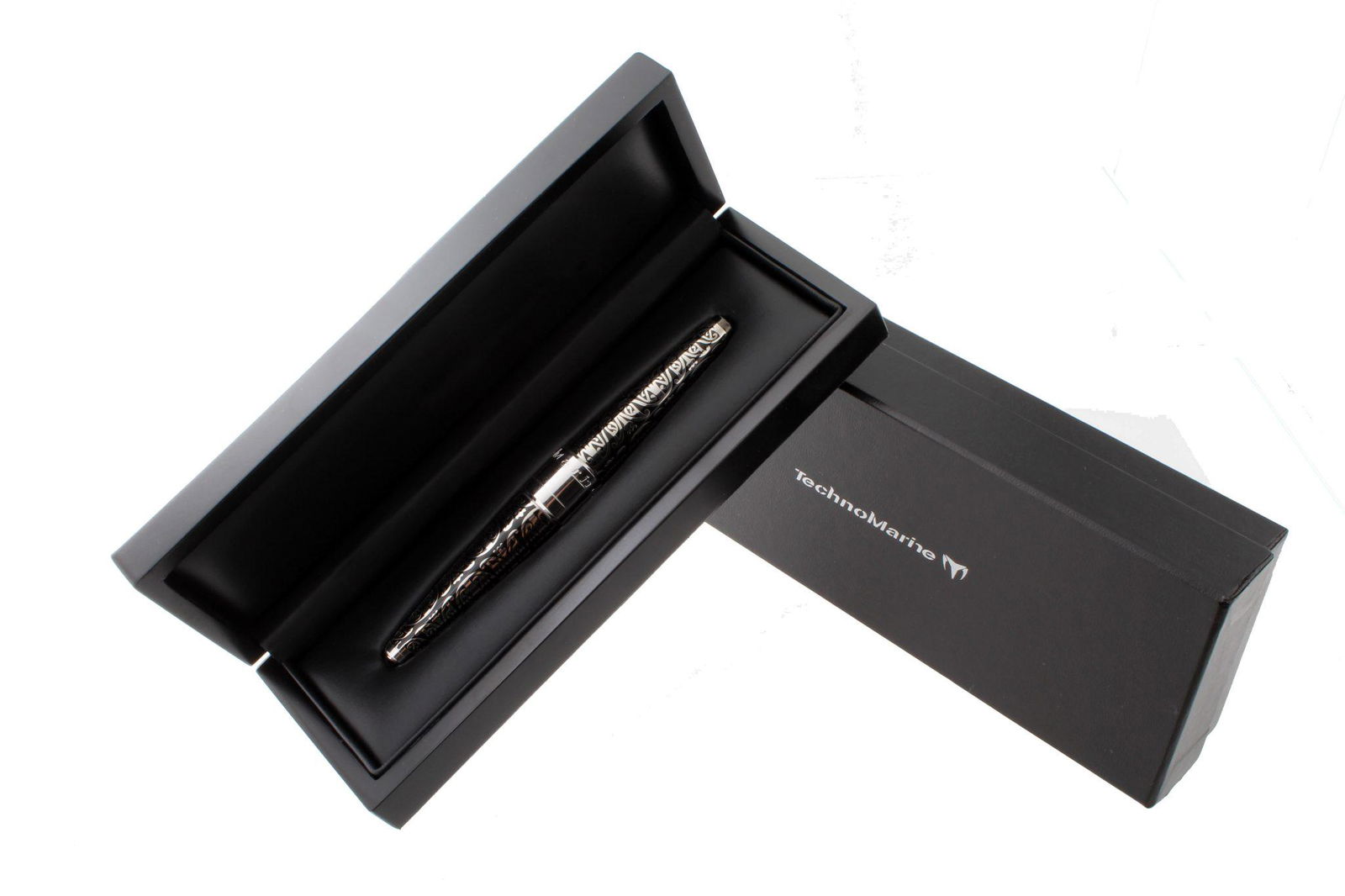 TechnoMarine Maori Ballpoint Pen: Description: TechnoMarine Maori ballpoint pen. Decorative pen. Accompanied by a fitted TechnoMarine ballpoint pen box. Condition: Overall condition is very good.